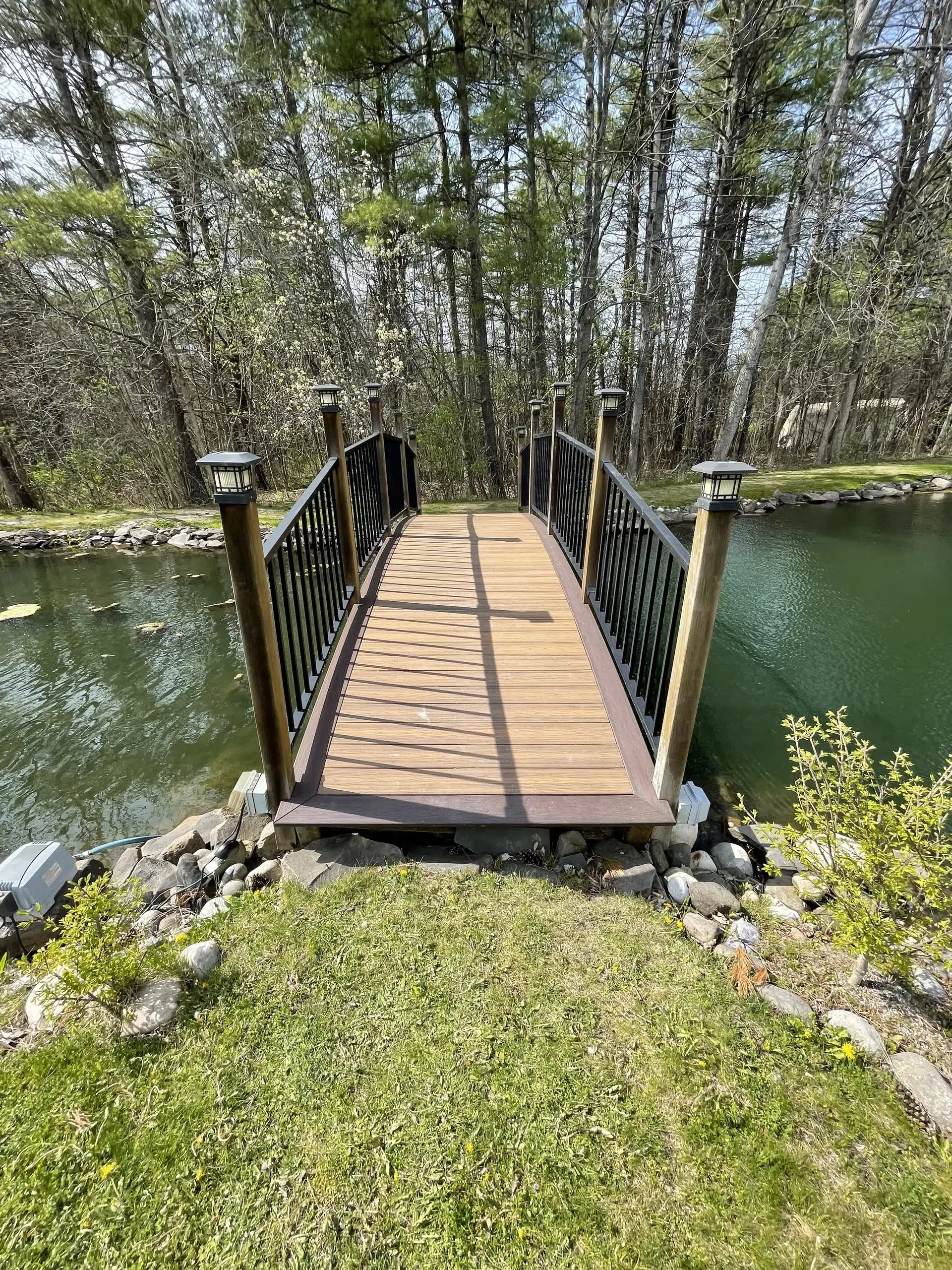 Floating dock built out over the water on a lakeside property