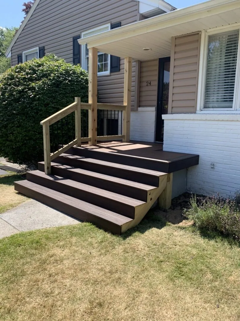 Rebuilt front porch with new decking and posts
