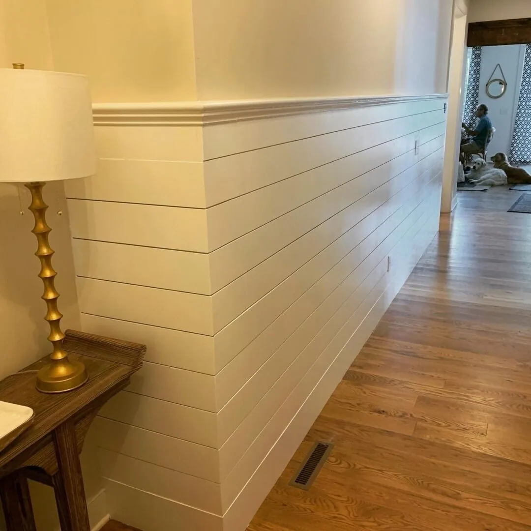 Completed hallway renovation with new trim and paint