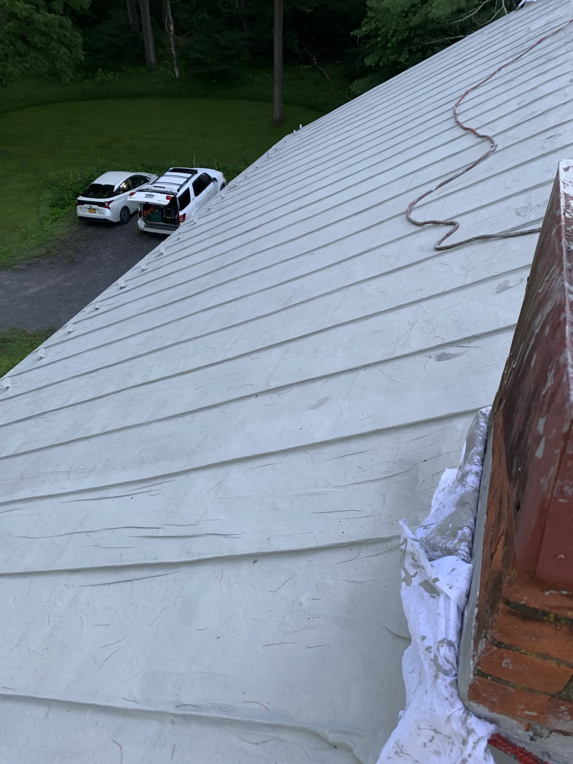Freshly coated roof on an Upstate New York home