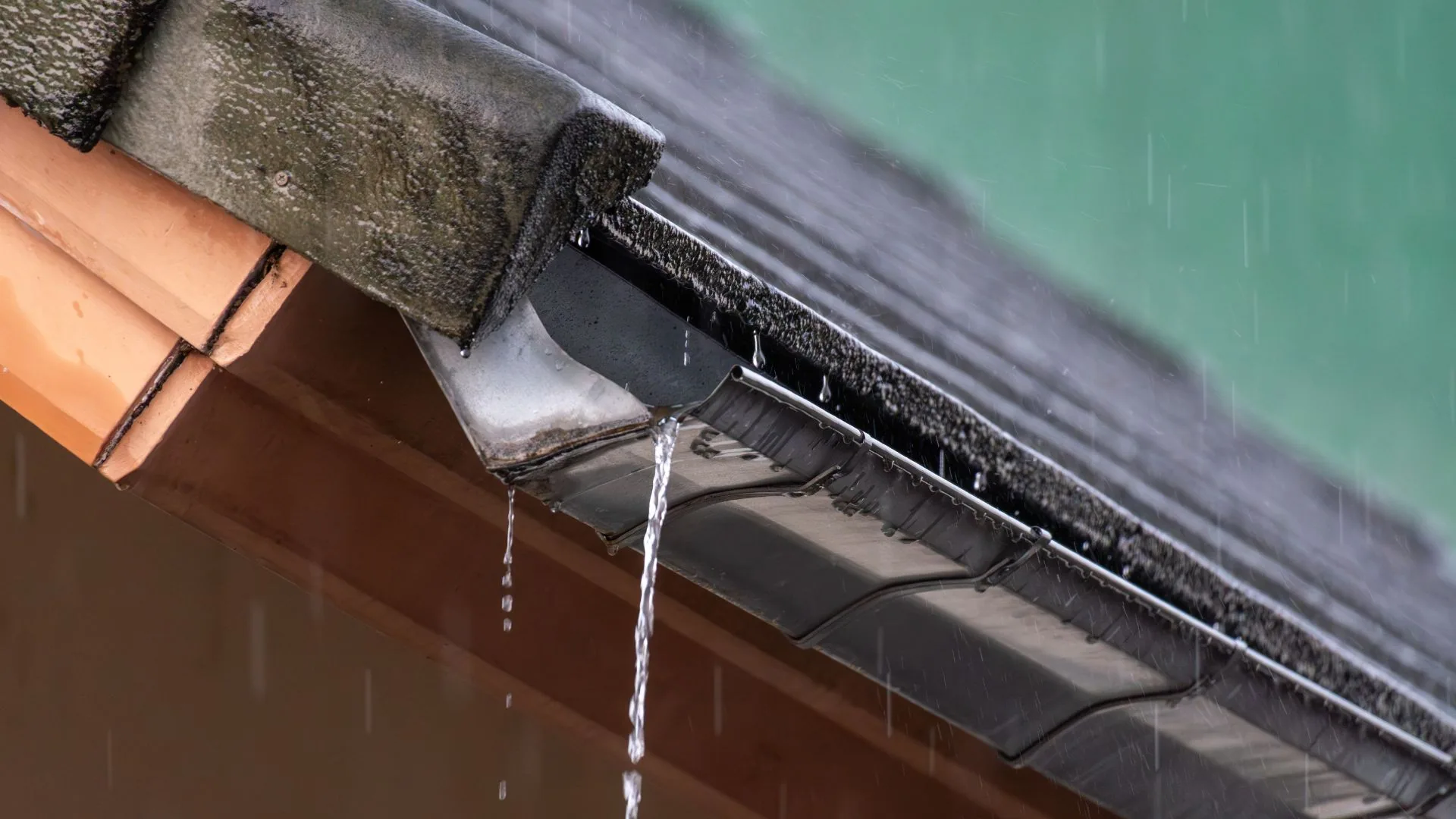 Seamless guttering running along a residential roof edge