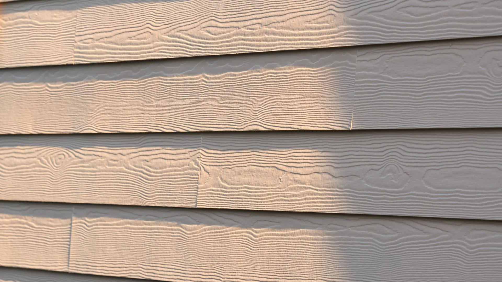 Fiber cement lap siding on a house wall