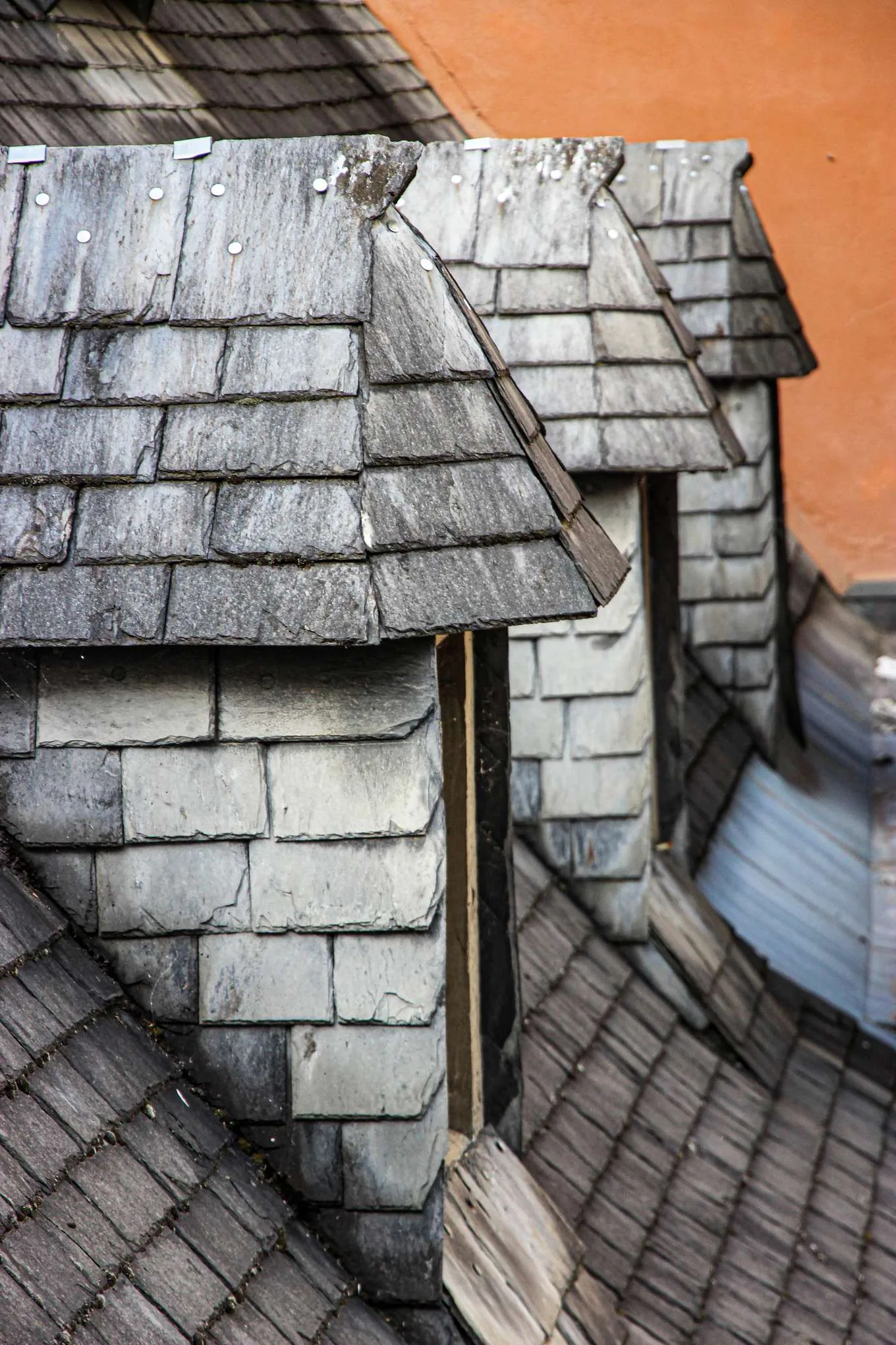 Close view of slate tile edges and weathering